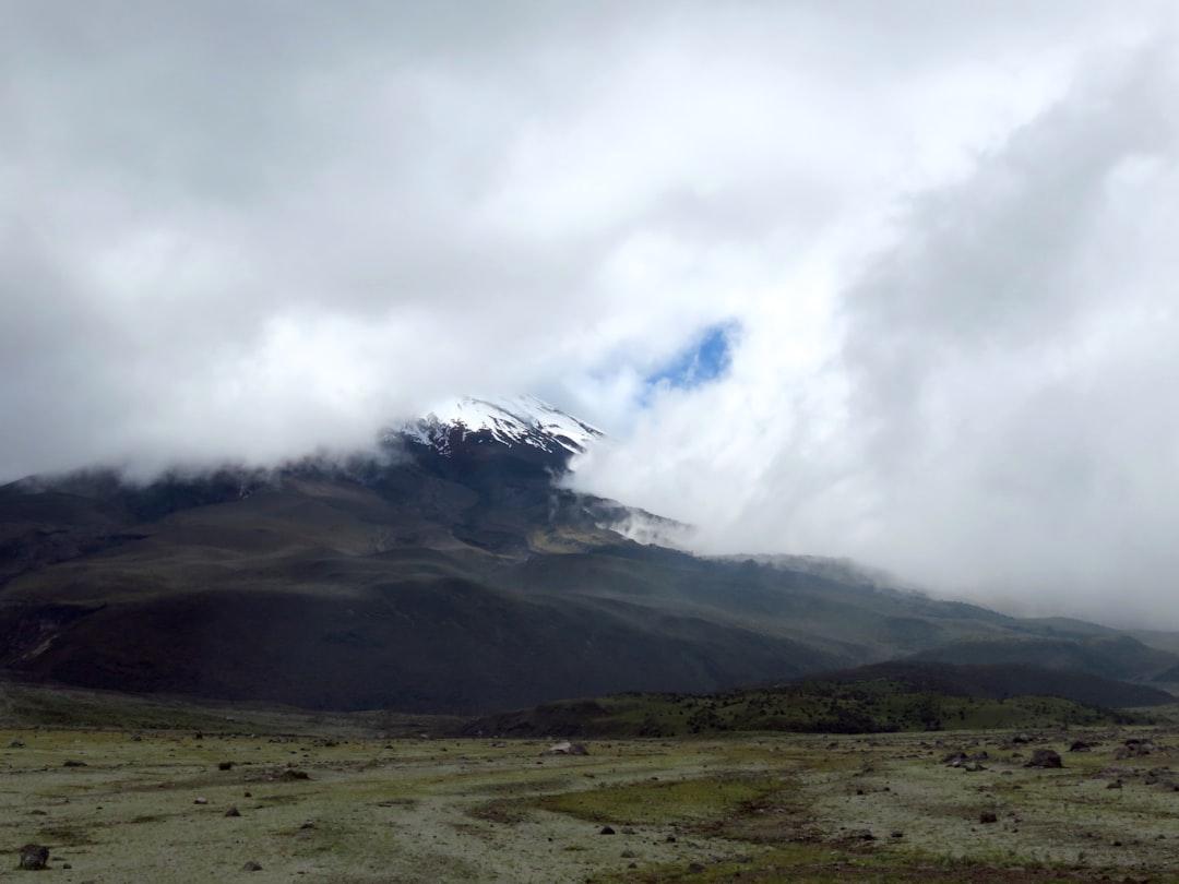 The famous Cotopaxi, with an altitude of almost 5900 meters (19,347 ft), covered in snow. The top remained in the clouds that day, but it did gave it a magical twist.
