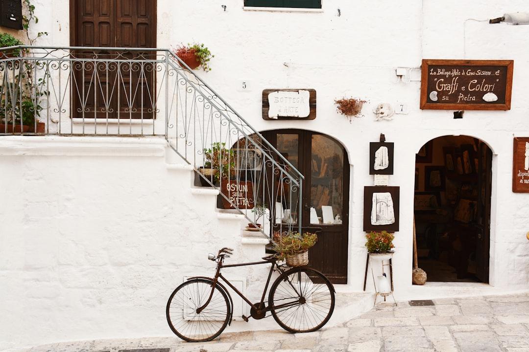Vintage bike in front of restaurant in Italy