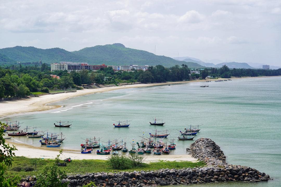 View of Khao Tao beach and fishing boats.