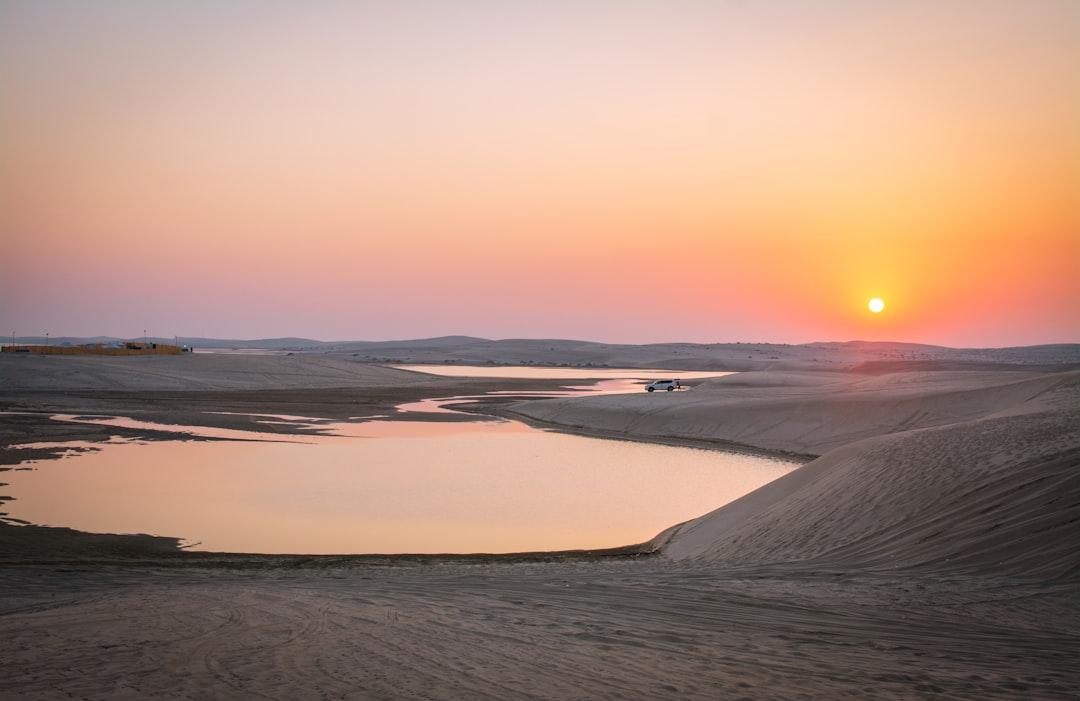 Sunset over qatar desert. 