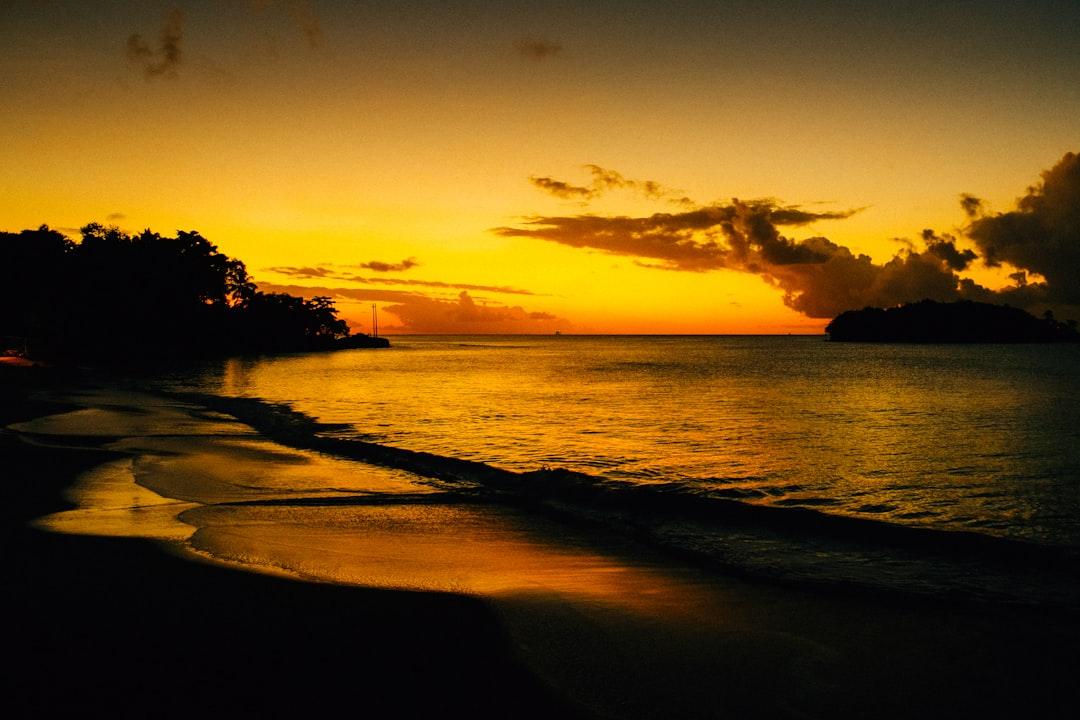A golden sunset on the shoreline of Halcyon Bay, St. Lucia.