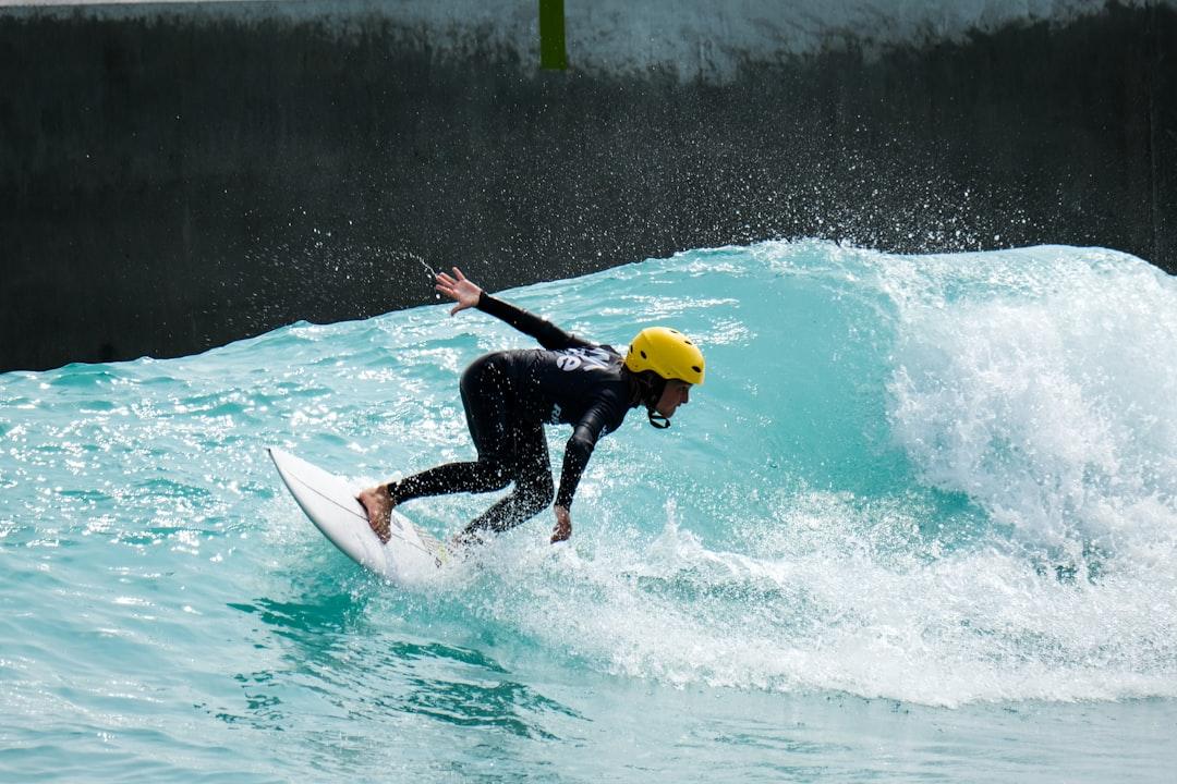 Photo of grom boy kid surfer, surfing the surf in Bristol at The Wave wavepool.