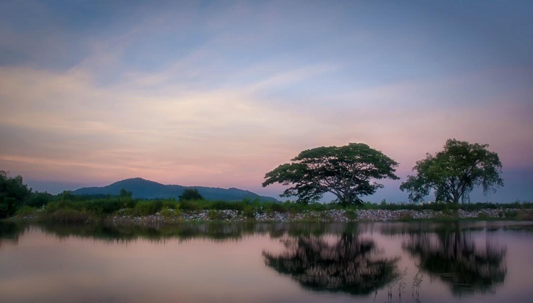 Sunset over a lake in Hua Hin, Thailand.