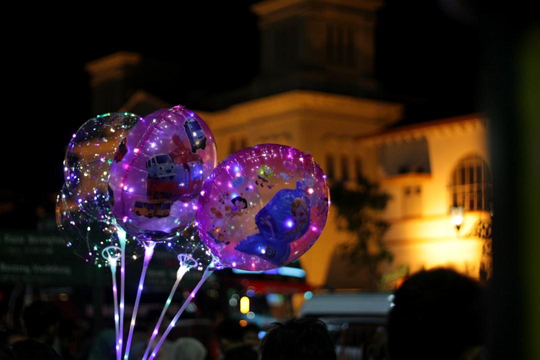 Taken at Km 0 of Malioboro, Yogyakarta. Childhood memories can be found here. Balloons with some pictures of cartoons like Spongebob Squarepants, Dora the Explorer, Frozen, etc., and also the lightings are the main focus in this photo to make it more beautiful.