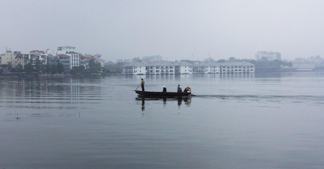 Went against my principles a bit here by increasing the saturation in production. Traditional fishermen, Hanoi, early morning.