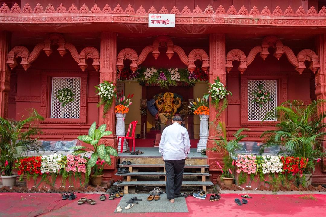 A man going inside a Ganesh temple during Ganesh Chaturthi 2019